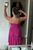 The dress is much more purple in person. I was really wanting pink. I am always between a Large and XL and should have sized down to a large. - Jenny C.