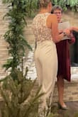 Wore this jumpsuit for my wedding rehearsal - I am not tall, so the length was perfect and didn't need any alterations. Looked very classy and expensive. - Chandler K.