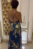 I loved this dress! It had such movement. I was impressed by how heavy the material was. It made it feel luxurious. Figuring out what to do with my boobs in a backless dress took a lot of tape and tears, but in the end, it was gorgeous. - Nicole E.