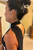 Love the dress. I get the Audrey Hepburn vibe. It was too long, so I had to have it altered, but it is quite stunning. I also wrap the neck scarf around twice so it doesn't pull as much. I possibly could have ordered a medium, but I love how it just makes me look tiny. - Sandra G.