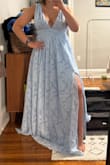 I bought this dress for a wedding that I'm a bridesmaid in, and although it should have definitely zipped up (see photo), the zipper would not go past the seam at the waist. For those of us who shop regularly on Lulus, this is a familiar issue. Not every dress will be like this, but mine was.
As far as the actual dress, it fit well, and it was gorgeous, definitely on the thicker side, and I probably would have been sweaty for the summer wedding. The bust was good on me and supportive (34C/32D). The dress was more empire-waisted than the photos show, but that's not necessarily a bad thing. - Isabelle L.