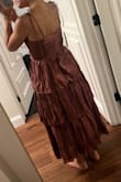 Loved the front of the dress, but there is a seam in the back on the top tier that lays super weird. I'm returning! - Amanda T.