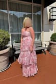 I sized up after reading reviews for many dresses at Lulus. I am typically a Medium/8/10 but bought a Large and it was perfect! Got so many compliments on it! Very comfortable, too. I recommend having someone else tie up the back for you so they can get it super tight, and it will stay up all night. - Shelby P.