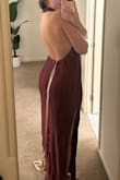 I ordered the burgundy for an October wedding, and it's so gorgeous. Reviews said that it runs big, so I ordered a small (I'm usually between a small and medium), and I'm glad I went with the small. The medium would've been too big. The dress is amazing, good quality, love the color, and super flattering, especially being tall with a slender build! I'd definitely recommend buying this dress for a formal event. - Madison K.
