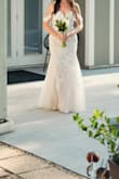 I ordered this dress for my wedding but I was skeptical. It was perfection right out of the box. It fit like a glove. I couldn't imagine a more beautiful dress for my wedding. - Angela W.