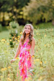 The dress was so beautiful in my senior pictures. The colors were gorgeous, and the movement and the flow of it was amazing. The only slight negative is you can't wear a regular bra, and the bust area gaped a bit, so if you're not large in the chest, you need to get creative with tape and sticky bras - Amy W.