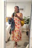 Cool, colorful rayon material which complemented my day out to the Zoo perfectly. The back portion is out, which helped promote a little more airiness (much needed in this August Florida heat) and made the dress even cuter. I paired with some yellow/mustard accessories. With so many beautiful, bright colors in this dress, it's easy to play around and find a color palette to your liking when dressing up. - Talysia E.