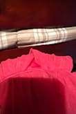 Item arrived ripped in multiple spots at the top. - Charity M.