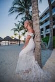 I had my sons pick out of 4 dresses I ordered for a getaway wedding on the beach. They all picked this one and it was the absolute most perfect dress. I have strangers compliment me in allll of my photos and needless to say this was beyond affordable and no alterations necessary! - Victoria H.