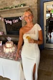 Loved this dress for my bridal shower! I received so many compliments. It's not something I usually would choose, but it is a very classy and elegant dress. The material is stretchy but still nice quality and a bit thicker. - Kristina H.