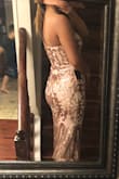 The dress was just like the picture. Fits perfectly without any adjustments. Very comfortable. Material is stretchy and holds up well. I'm am very satisfied with the dress. Highly recommend it. - Jennifer A.