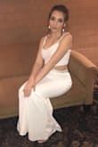 This dress was so beautiful the material everything was perfect I had to buy big and have altered but that's just cause of my body shape. Absolutely loved this dress - Angela R.