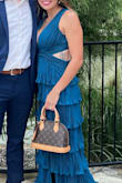 This dress was great for a cocktail attire wedding! 
I wore shorter heels for comfort so it was a little long, but with a taller heel the length would be about perfect. 
The dress was comfortable to wear, no need for bra/cups. 10 months postpartum, and I thought this was the perfect dress that didn't cling to the body. - Destyn W.