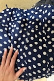 It was love at first sight. However, after just a couple of hours of wearing, the middle seams ripped :(. So disappointing, as I love the color and the fit. - Dionne C.