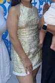 The fabric was beautiful and incredibly detailed, and the fit was flattering. Loved the dress - Nicole C.