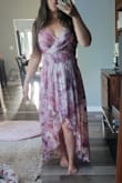 I bought three dresses just in case, as I just had a baby and wasn't sure what would fit me. Well two out of the three fit! This one won as it was lightweight and airy so perfect for the California wedding. I have a wider back and like how this dress doesn't need to zip up that high, so it still works for me. - Tara K.