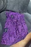 Beautiful dress! Just too small around my waist to wear comfortably - Kyra R.