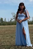 Usually, I have a hard time doing up these zippers around my ribs. (Ribs/under bust is 38 inches. Over bust is 41). I had to "officiate" my cousin's wedding, and it was perfect. I felt elegant and respectful. It was very hot that day (31°C) and mild sweating, but a very nice light fabric. I got many compliments! - Kira D.