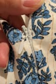 Material was not as soft as I thought it would be. There was makeup on the inside collar, and the zipper was hard to get down and did not want to go back up, even with the dress off. I do not want to try on or keep. - Ericka O.