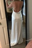 I purchased this dress for my rehearsal dinner after going through several other dresses from other companies that were total flops. It's elegant and fits perfectly. I feel beautiful and it's exactly what is pictured on the site. 10/10 - Rae F.