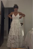 The fabric is lightweight and the pattern is very pretty! Perfect for a summer night out! I plan to wear this for a night out for one of my wedding events. I bought a size 4 and it fits perfectly. The back design is gorgeous, and I cannot wait to wear it this summer! - Marina S.