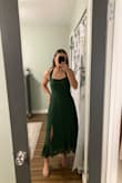 This is my first dress that I have ever purchased online, so I was a little nervous. However, I was not disappointed! When I was reading other reviews for this dress, some of the comments said the straps weren't adjustable, but mine were. Originally, I had tied the straps just like the picture, but found the straps to be a little loose. Instead, I created the dress into a halter top, and it was a success! The material of the dress was comfortable and light, perfect for the wedding I attended. I also got many compliments! Would definitely recommend this dress - Addy L.