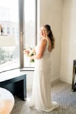 I bought this dress for my elopement/micro wedding, and it was stunning! The quality is excellent and looked amazing in person and in photos. I originally ordered my normal Lulus size (XL) but had to exchange for a large since it runs big. There is a nice stretch to it while still having structure. The beading was my favorite part!! - Danielle H.