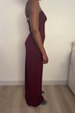 I bought this on sale, and I have to say that the quality is better than expected. I measured myself before putting in the order and used the sizing guide. The dress was a little loose at the top and big at the bottom. It is also quite long. If I had ordered an XS, I think it would have fit better. I do not mind having a bigger size as I can adjust it and make it smaller. The fabric is stretchy, so this dress would look better on a curvier girlie. The lace at the top is also a bit stretchy. - Maleeta D.
