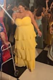 This fit perfect especially as a woman with a 44H bust. The top part stayed up all night through 3 hours of dancing. I got so many compliments. Absolutely loved this dress. - Zaya N.