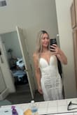 I am obsessed with this dress. I love the detailing all over, especially the stitching that is similar to macrame look. It's perfect. I originally ordered a medium, but it felt way too large. The small is better, but I'm taking it to a tailor tomorrow to get their opinion. - Emily R.