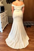 This is such a pretty dress, LOVE the buttons! It was a bit tight on me. I'm typically a medium, and that's what I ordered, but it wasn't flattering on my body. I loved the style though! - Peyton W.