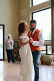 I had a last-minute Hail Mary moment looking for a wedding dress, and what I purchased exceeded my expectations. From the moment I tried it on, I finally felt like a bride. It was everything I didn't know I was looking for. My original vision was shabby chic and lace. Two dresses later, I couldn't fall in love with them. I looked at this dress several times until I clicked purchase. Because of my time crunch, I paid for it to get here quicker. It arrived a day early. Once I tried it on, I knew it was the one I would wear all night and no outfit change. Fabric is soft and beautiful, don't wear colored underwear. I added two small loops under the train so I could hook it to a bracelet to carry the train. My husband said he was stunned on how elegant, flattering the dress was on me. I got an extra small after reading the reviews, and I'm glad I did. It was a perfect fit! - Kayla F.