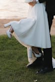 I can't say enough about these heels! I wore them ALL day during my outdoor wedding - from walking on grass and sand, to climbing plenty of stairs, and dancing the night away on a deck, and they were perfect in every way! They fit like they were made just for me and stayed incredibly comfortable no matter what I was doing. Not to mention, they are absolutely stunning - the satin is gorgeous and really elevates the shoe. High heels can be a struggle for long events, but these made me feel confident, supported, and stylish from start to finish. Truly a dream pair for any special occasion! - Kaylie B.