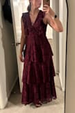 This dress is beautiful and comfortable. I did have to get the neckline tailored because it was just a little too low for my liking. But otherwise, it's very comfortable and the perfect length! The medium fit me perfectly. - Amber C.