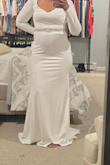 Firstly, I am 3 months postpartum and still have some weight to lose so I am in between sizes. But based on other reviews, I got a medium and it fit the way I wanted. Fitted in the hips and thighs area, but draped nicely to the ground with fabric to spare for when I wear heels. The fabric is lined and not see-through. It's very stretchy and roomy without being too loose. One problem, the shoulder area was a bit loose due to how the back was cut. Quick fix though. Overall, the dress is a good balance between sexy and classy. I loved the dress, but I opted for a sleeveless dress from lulus for my wedding next march! But for long sleeve lovers, this dress would be great for a fall/winter, even an early spring wedding. It will keep you warm without being too hot. Buy it, it will surprise you! - Charlene S.
