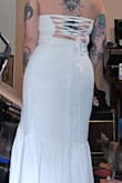 This dress is super fun for my Vegas elopement, and I am excited to wear it! I opted not to wear the scarf it comes with. I also recommend fashion tape for the top and seamless underwear. I tried this on with non-nude underwear, and you cannot see the color at all. The top is also lace up, so it is very adjustable! I love it! - DIANA L.