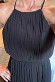 Love the cut and open back, but the top part had too much material and was heavy. The thin neck straps didn't provide enough support for the top to stay fitted in place. It just didn't lay nicely and felt boxy, had to return. - Cheryn M.