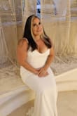 I wore the gown at my ceremony for our 25 year vow renewal. The mermaid gown was pure white and perfect for our vow renewals. - Jessica M.