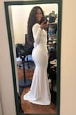 I ordered a bunch of dresses because I wanted to look classy, simple but yet stunning on my civil ceremony. I was a bit worried because they didn't have S so I went for the XS and wow, so perfect. It fits like a glove, so I recommend to size down if you want a tight fit. I was worried that because of the kind of fabric you'd be able to see through th cellulite but no ma'am! This dress highlights all of my attributes and makes me feel beautiful and confident. I cannot recommend it enough. - Nacari D.