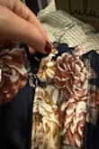 First- I love this dress. Unfortunately, the zipper is nonfunctional and will not zip. I couldn't get it zipped, and then I couldn't unzip it because it came off track. I almost had to cut myself out. Do NOT recommend unless you replace the zipper before wearing. Very unfortunate as it such a lovely dress. - Karrie W.