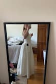 Fits well, a little short, so I can't wear heels. Decent support for large bust, but I don't think I have enough room for a bra underneath. 
Dress held up well when I steamed it to get the wrinkles out. Definitely keeping it. - Casey W.