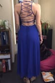 I got this dress and a few others trying to find a good one for a military ball. I got the Royal Blue in Medium and the Black in small. The sizing of this dress was way off, the small was longer than the medium although the small was slightly more snug around my waist. Both sizes were too short in general, showing my full ankle with flats on. The stitching and back laceup was beautiful though. - Kathryn L.
