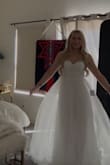 This dress is gorgeous. I feel like an angel. I love how when the sun shines through the tulle you can see the silk slip beneath, truly ethereal. Also extremely comfortable. I bought another address that was mermaid style, and it was so heavy and uncomfortable. I feel like I'm floating in this. - Emily R.