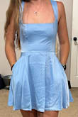It fit perfectly. Loved the pockets and loose skirt. Liked the strappy back too. - Jackie S.