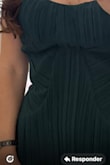 The dress is beautiful. The color is just like in the picture. The design is great. It looks gorgeous in the model. The thing is that is not well made. The fabric in the mid section is totally loose. It makes the dress look cheap and it doesn't flatter your body. - Adriana S.