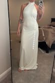 Beautiful dress but a tad loose in the chest area. I'm 5'9 and I would need it taken in at the length even with heels. - Brianna R.
