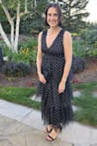 Absolutely loved this dress! I wore this dress to a fall wedding and couldn't have been happier with it! It's incredibly flattering and has a unique, elegant look that stood out in the best way. I'm not sure why it has negative reviews. Yes, it arrived a bit wrinkled from packaging, but I took the time to steam each tier and the layers fell beautifully afterward. The material wasn't itchy at all for me, and the fit was perfect. I typically wear a medium, and this fit true to size. The only small adjustment I made was having the front stitched slightly so it wasn't as low-cut . I received so many compliments and can't wait for another occasion to wear it again! - Liza P.