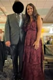 This dress was very comfortable, and I felt fabulous in it. I would highly recommend for a wedding guest. I received a lot of compliments. I ordered a SMALL and it fit well, but I think an XS would have fit the top part a little better. I have an a-line shape so it may not have fit over my hips. I was worried about how low cut it is, but I was able to get a V Plunge bra in time that worked. For extra safety I used a tagging gun and fashion tape. If you don't need to wear a bra or can do the sticky ones then this should not be an issue. I am 53 so I needed and wanted more support. I added some pictures, the angle on the 2nd one isn't that great, but shows more of the dress. - Kim H.