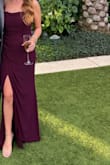 I loved this dress and I can't wait to wear it again! I did get it tailored to take an inch off the bottom so that it didn't drag on the floor. - Gigi D.
