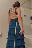 Golly, did I want to love this dress. It's beautiful. The material is gorgeous, and it is very comfortable. I am completely obsessed with this pleated plisse material! 

That being said, the slit is VERY high, which is a little awkward looking. I considered keeping it and sewing the slit shut some, but decided I didn't love how it looked on me. It seemed the waist hit me a bit too high. 

I also felt that the strings in the back were a bit awkward looking on me. I felt "big" from behind. Would maybe look better as a fully open back dress with a halter neck or something. 

Overall- beautiful dress, but could use some tweaking.

Please ignore the awkward pictures- they are screenshots from a video I took. - Annie C.